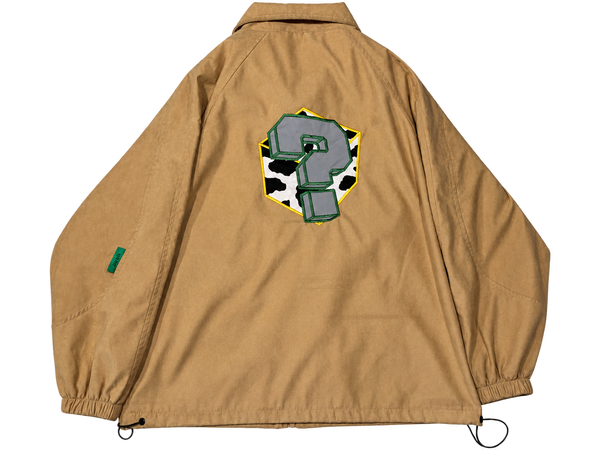 Cow Tippin Suede Jacket back with dimensional question mark over cow-print patch