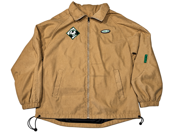 Cow Tippin Suede Jacket front with green-bordered cow-print diamond patch
