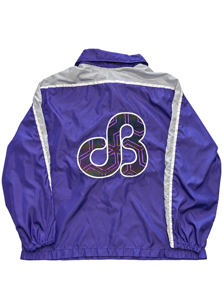 dB Purple quarter-zip windbreaker back in normal light