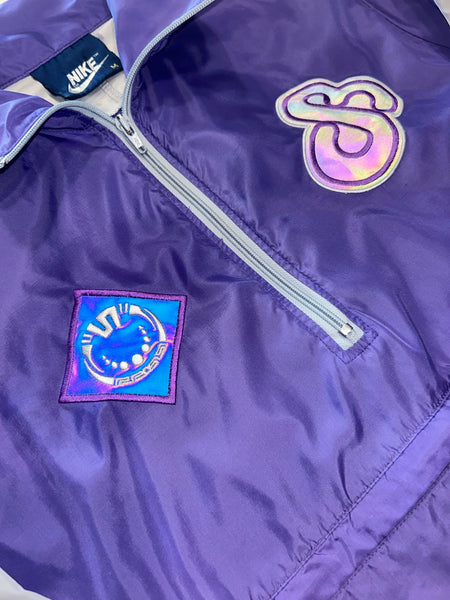Close-up of special reflective patchwork on dB Purple windbreaker