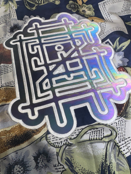 Griz Tea Time Windbreaker reflective embroidery detail