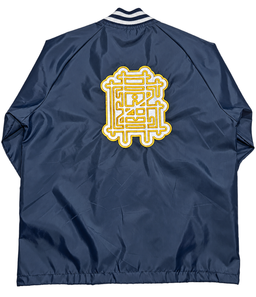 Back of navy Griz Riffle Bears lightweight bomber with large white and gold GRiZ emblem