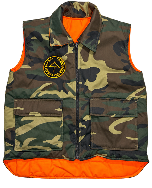 Front of OTT CaMo Hunters Vest in woodland camouflage with orange lining and gold OTT embroidery